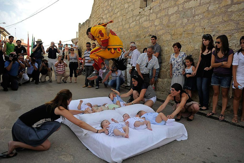 The Baby Jumping Festival (Castrillo de Murcia, Spain)